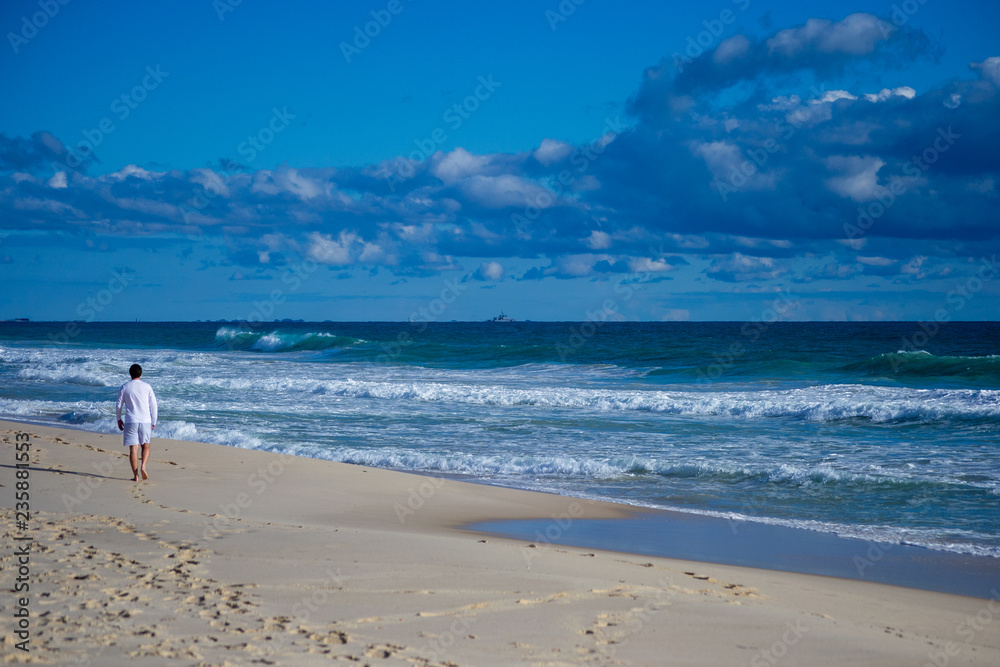 Landscape of a beach in north perth in a windy day full of waves water