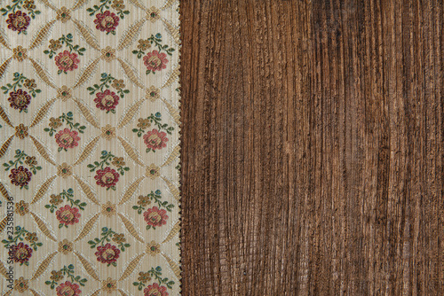 Floral green fabric on the old wood