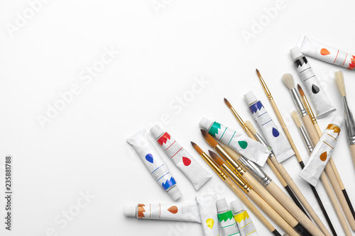 Art of Painting. Painting set: brushes, paints, acrylic paint on a white background