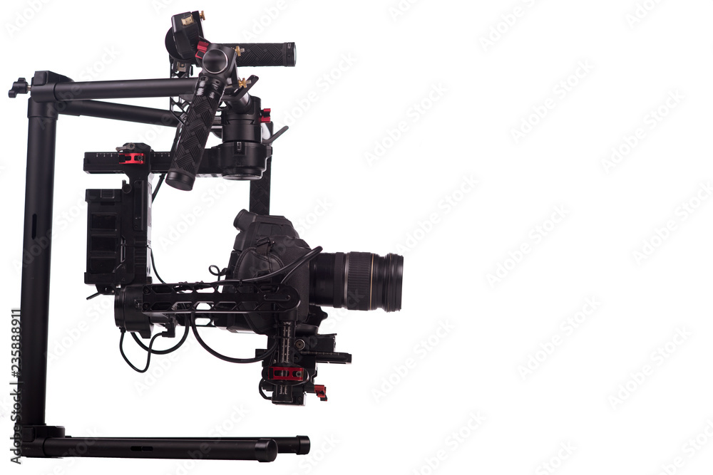 System stabilization video camera and lens on steady equipment support such as gimbal steady or stabilized. White background System stabilization video camera and lens on steady equipment support such as gimbal steady or stabilized. White background