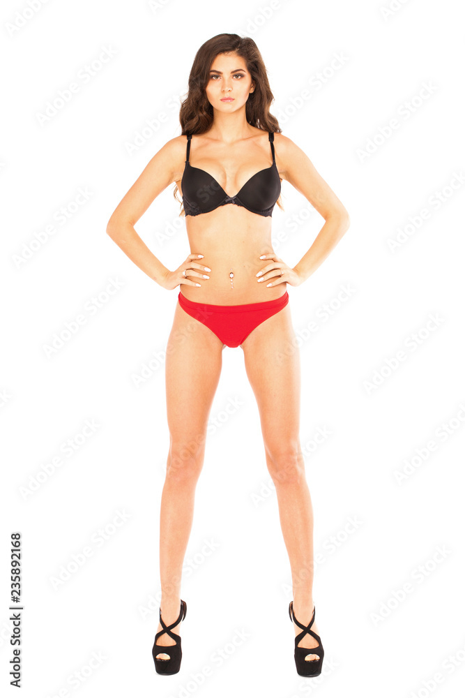 Full length portrait of young woman wearing sexy underwear