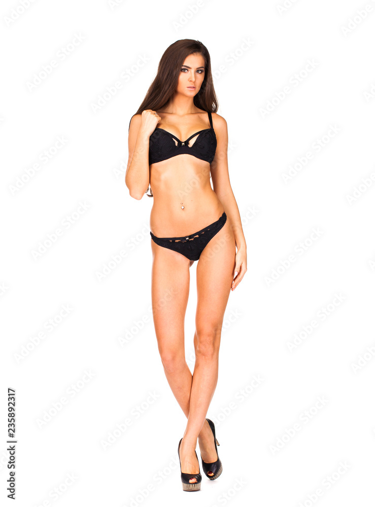 Full portrait of sexy lady in black lingerie, isolated on white background Full portrait of sexy lady in black lingerie, isolated on white background