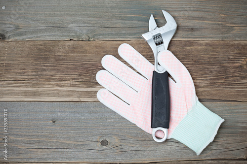 white glove and adjustable spanner