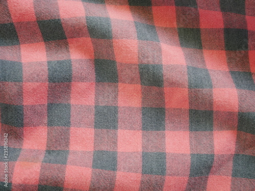 Red Square pattern fabric background. Scott chintz fabric for design.Plaid cotton texture.
