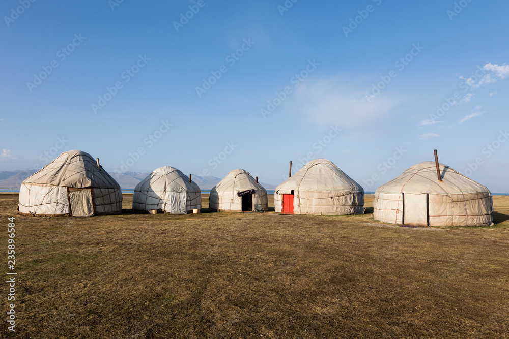 A yurt settling in the Tian Shan mountains at Song Kul lake in Kyrgyzstan