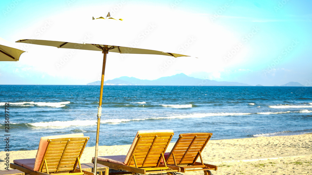 Chairs on the sandy beach near the sea.Holiday and vacation concept for tourism.Beautiful beach in Vietnam., Danang.