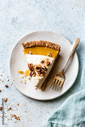 Close up of pumpkin cream pie served on plate