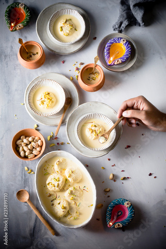 Ras malai, an Indian sweet delicacy, having a rich cheesecake texture photo