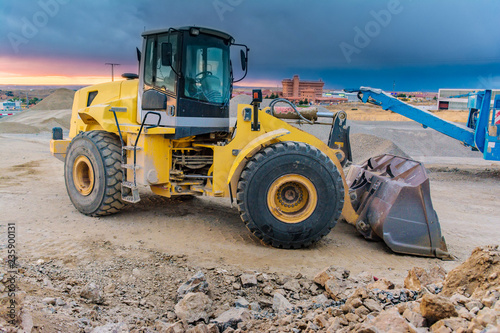 Quarry with an excavator and heavy machinery