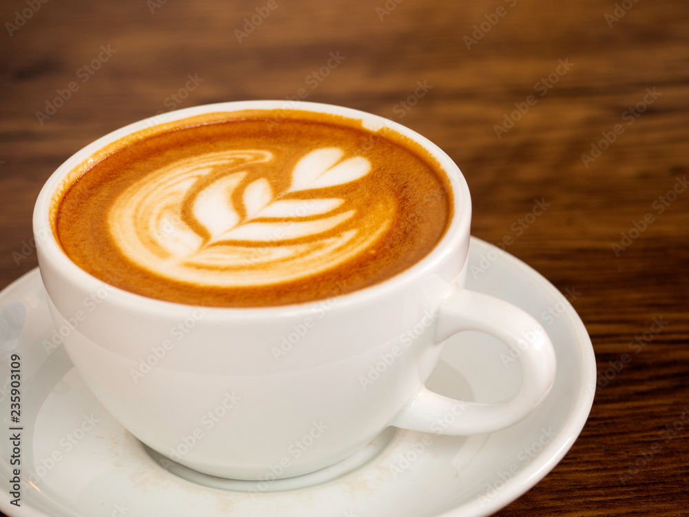 White coffee cup on wood table, coffee time White coffee cup on wood table, coffee time