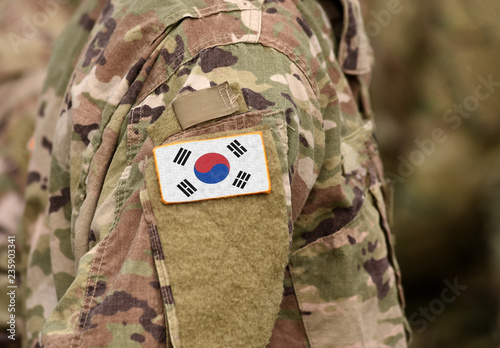 Flag of South Korea on soldiers arm (collage). photo