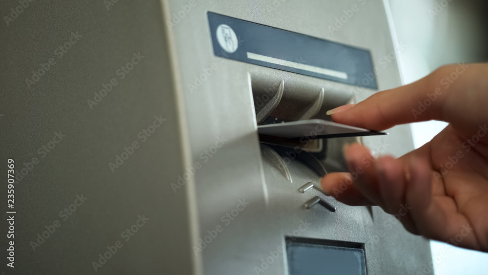 ATM reader taking credit card and returning it after identification, security ATM reader taking credit card and returning it after identification, security