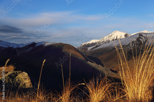  French Alps at sunset. Autumn landscape and snow peaks