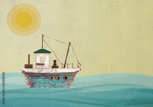 Toy sailboat on landscape painted wall background