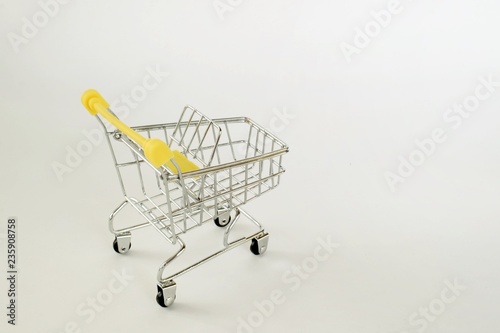 Supermarket cart on white background.