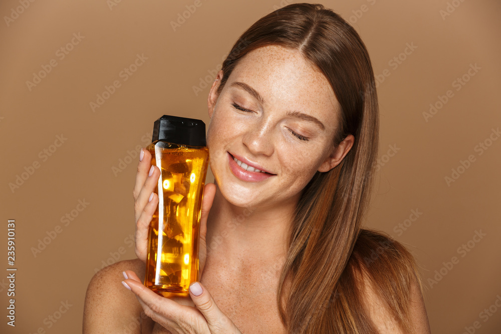 Beauty portrait of a smiling young topless woman Beauty portrait of a smiling young topless woman