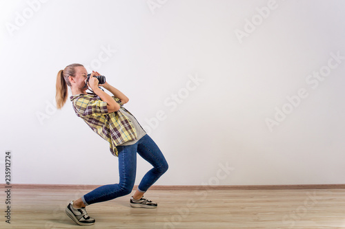 different photographer poses: bending, squatting, lying down