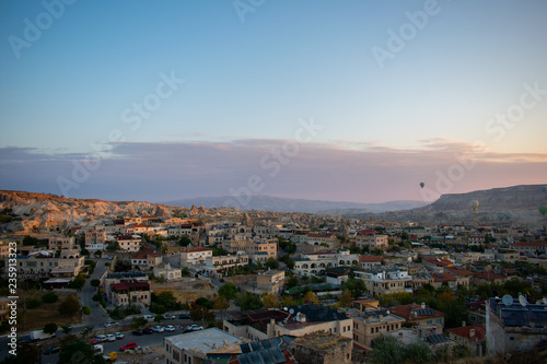 Aerial view on Sunrise over Cappadocia. Balloons flying against blue sky. Goreme most popular place in Turkey  © Maciej