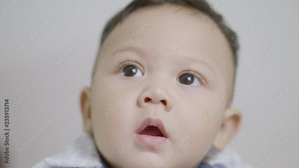 Close to the face of Asian children, Cute boy looking up Close to the face of Asian children, Cute boy looking up