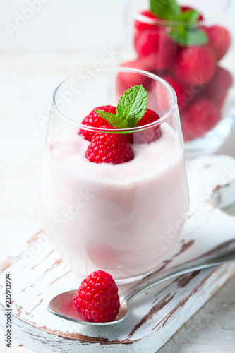 Yogurt smoothie with raspberries, fruit dessert, healthy dieting concept Natural detox.
