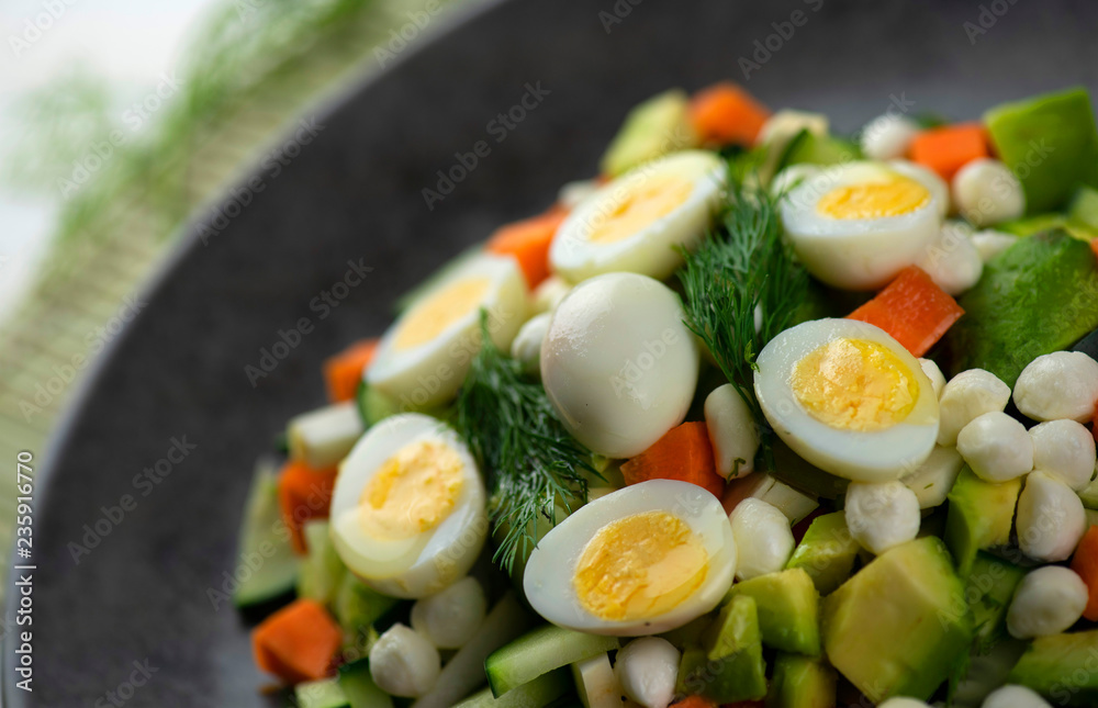 Fresh vegetable salad with quail eggs Fresh vegetable salad with quail eggs