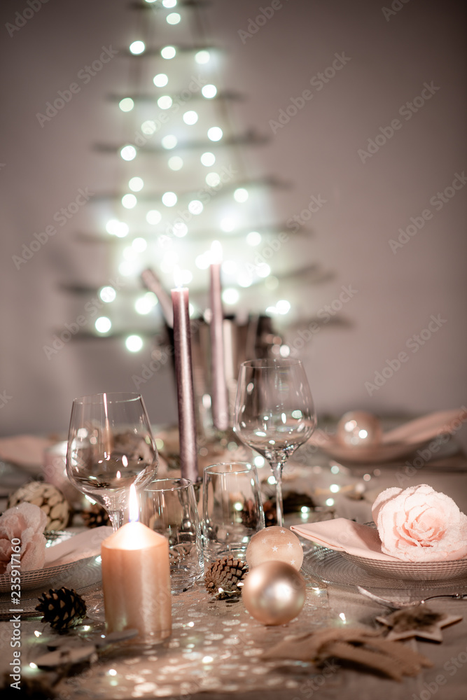 christmas eve party table with wine glass and glitter season's greeting decoration christmas eve party table with wine glass and glitter season's greeting decoration