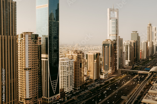 Beautiful aerial panoramic view to Dubai downtown city center skyline and Sheikh Zayed Road in the sunset  United Arab Emirates