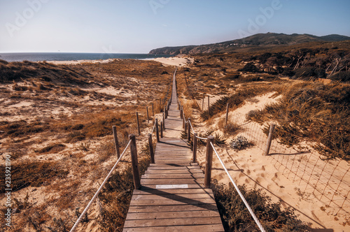 Path to Guincho Beach in Portugal made on sand dunes © seligaa