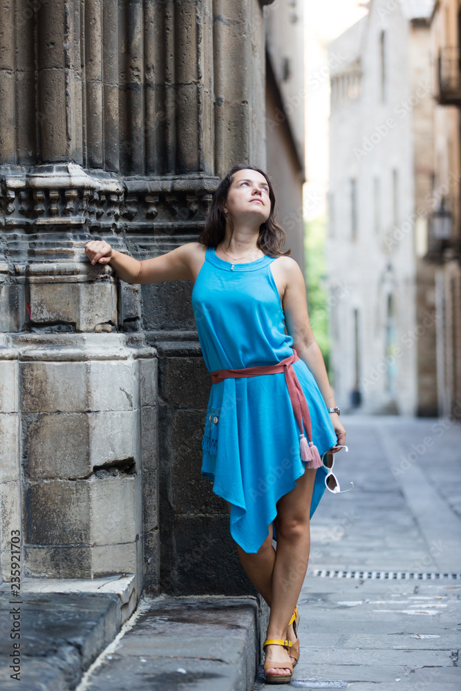 Girl walking in city streets