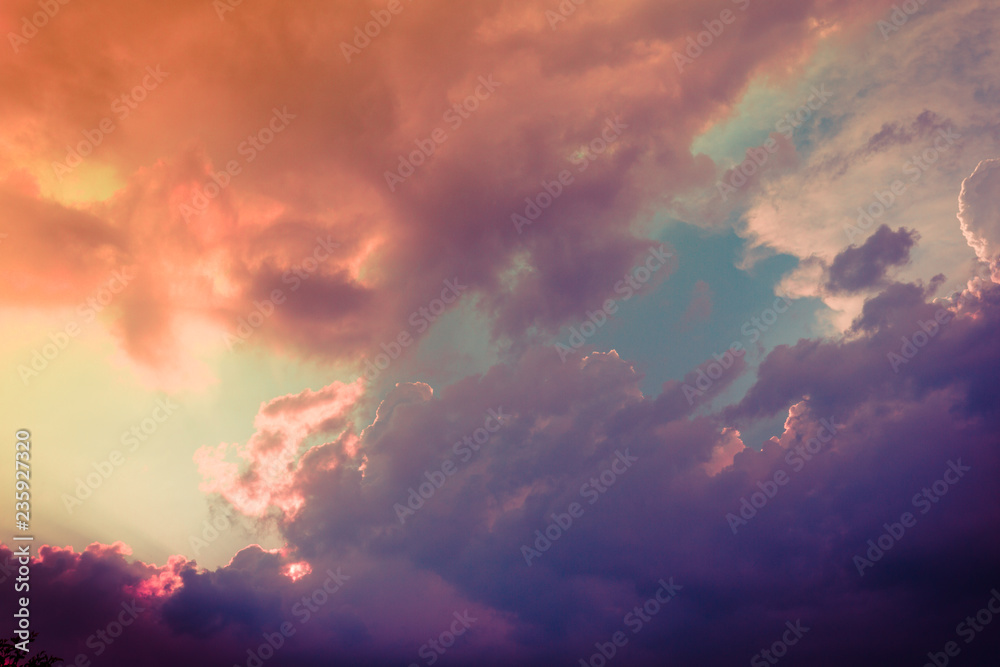 fabulous multicolored Cumulus clouds at sunset