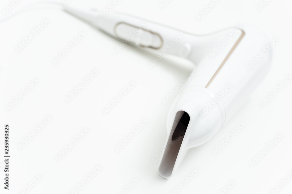 White hairdryer on white background. White hairdryer on white background.