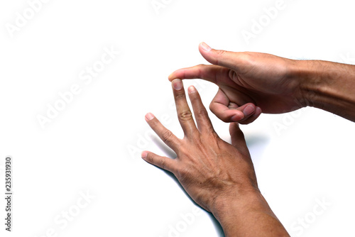 Canvas Print the finger of right hand provoking the nail of left hand on white background iso