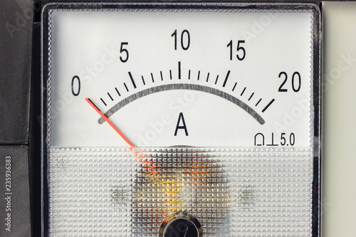 The white scale of the ammeter with zero position of the indicator