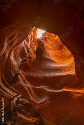 Orange yellow spiral wave form tunnel of upper antelope,,Arizona