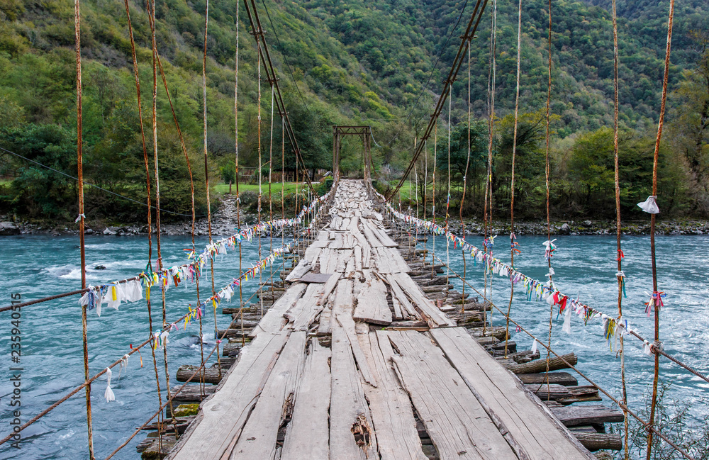 Fototapeta premium Bridge over the river in Abkhazia