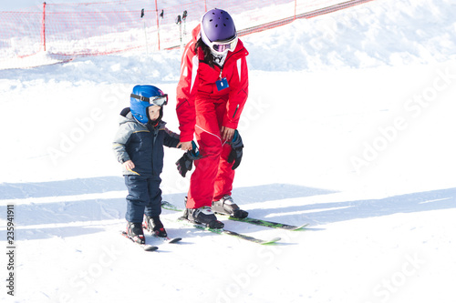 instructor child activity ski resort winter outfit