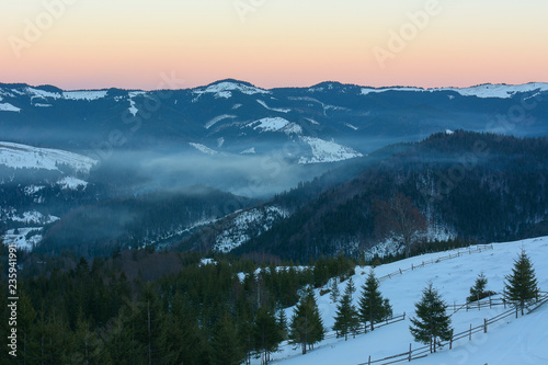 Fototapeta Naklejka Na Ścianę i Meble -  Sunset in the mountains in winter