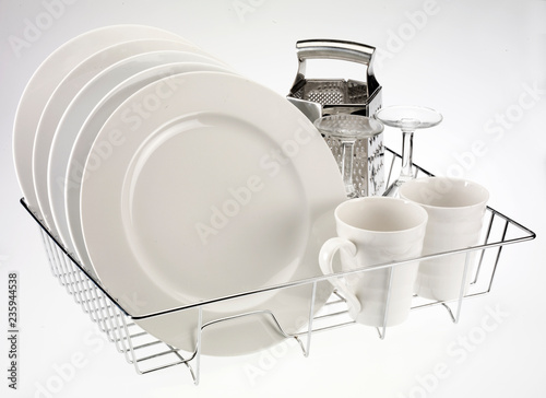 DISH RACK WITH CLEAN WASHED DISHES photo