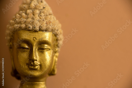 Canvas Print A buddha figure with an orange background