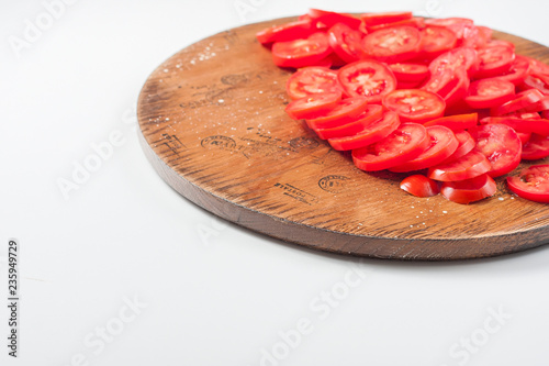Preparation tomatoes on drying tray. Organic healthy food