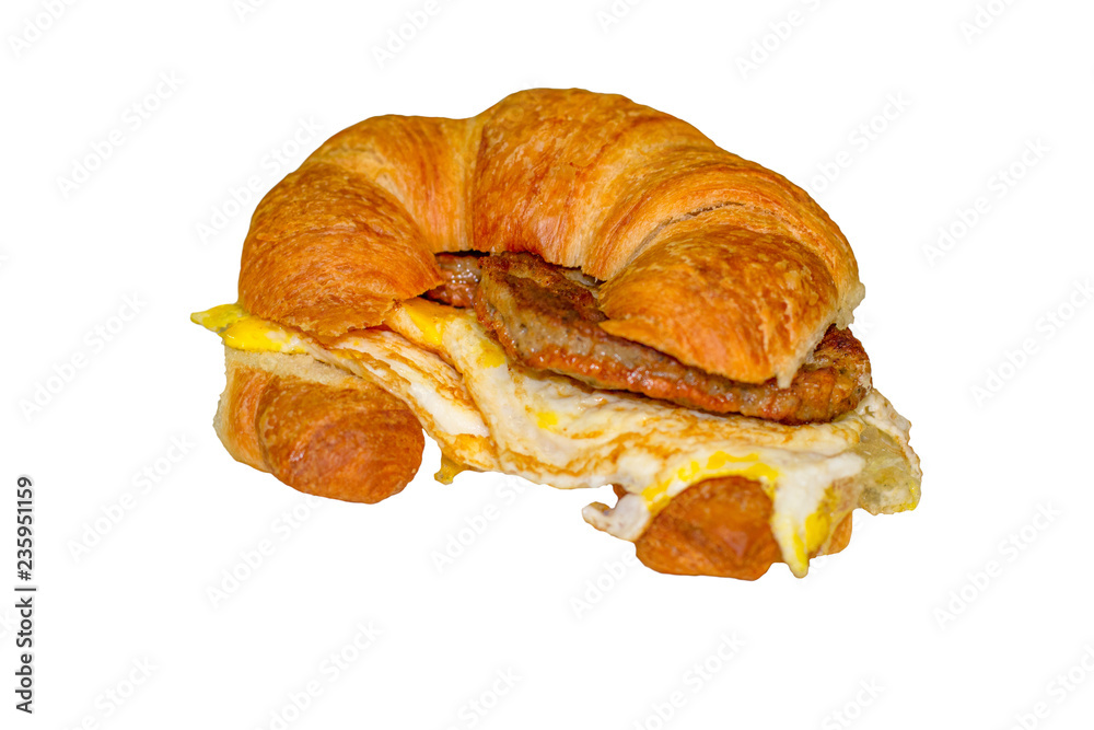 Sausage egg and cheese on a croissant Sausage egg and cheese on a croissant