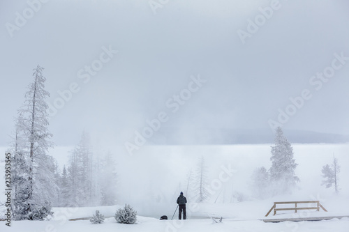 Winter Photographer In Yellowstone National Park