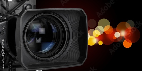 Professional video camera on dark background photo