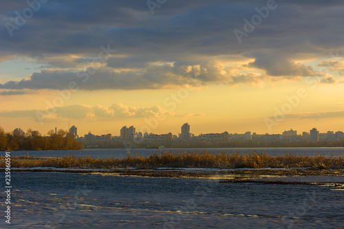 Sunset over the Dnipro river in Kyiv, Ukraine in the early spring