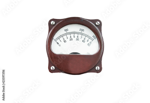 Retro devices on a wooden wall. Vintage measuring tools in a barn. Old phones.