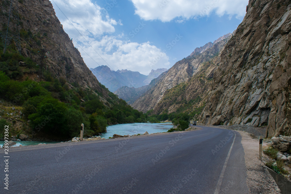 Fototapeta premium Road and river in Tajikistan