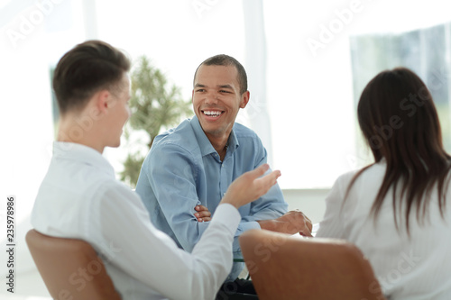 closeup.business team talking sitting in the office