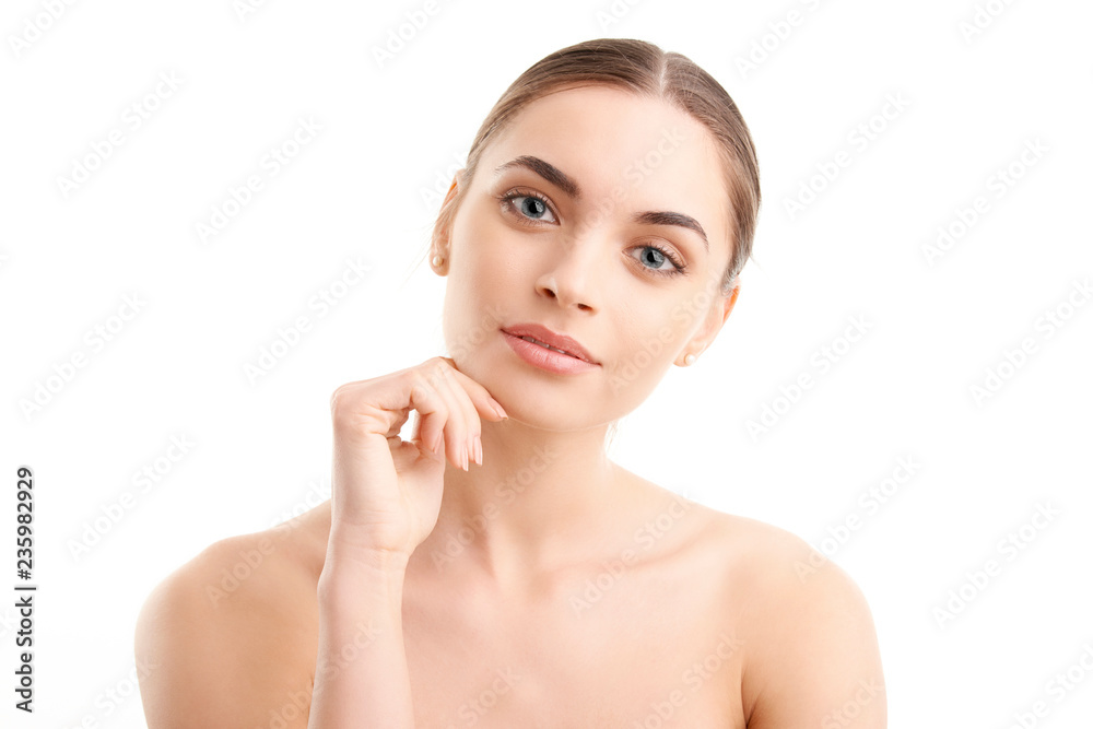 Young beauty portrait. Studio shot of a young woman with perfect skin. Young beauty portrait. Studio shot of a young woman with perfect skin.