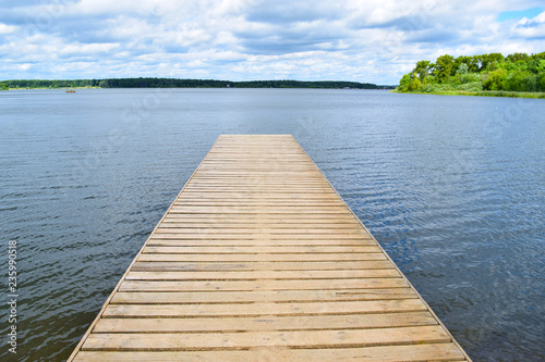 Wooden Pathway Leading to a Lake and Spectacular Landscape