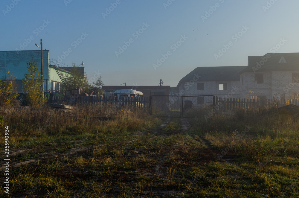 Abandoned yard in the fog. Abandoned design. Construction in progress.